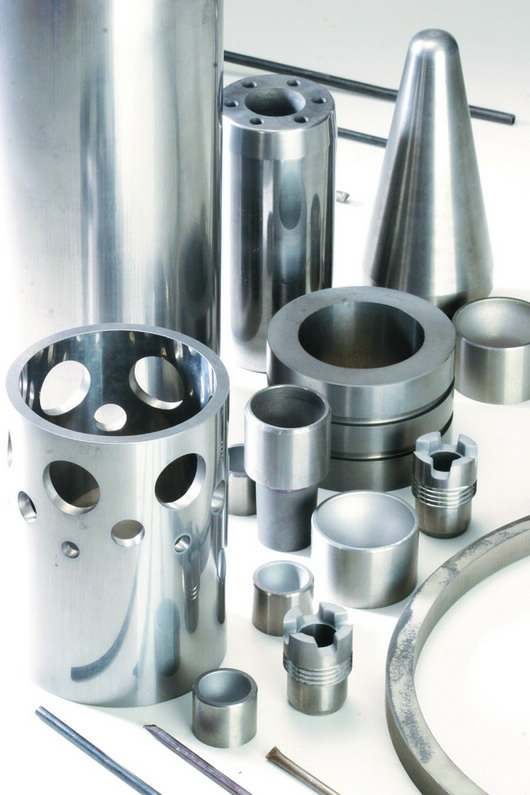 Carbide parts and hardfacing materials for valves